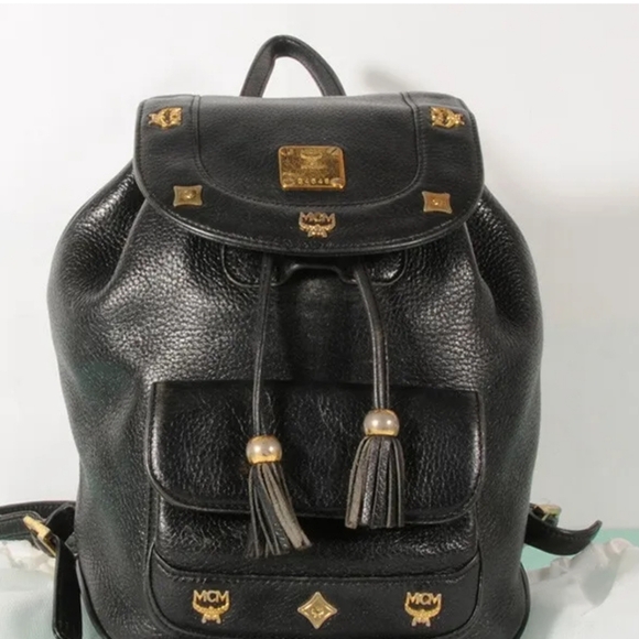 MCM Black Leather Small Backpack Men\'s Women\'s Gold Clasp Zipper Logo Pulls